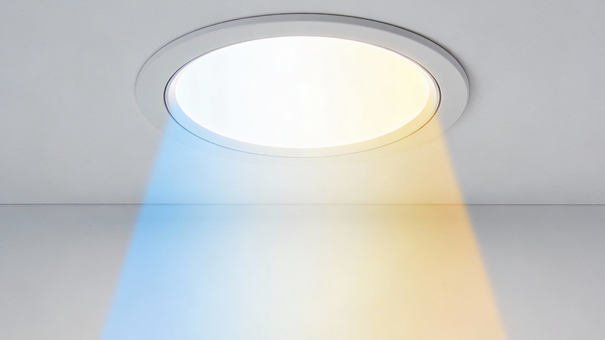 Ceiling light fixture emitting a soft glow on a neutral background